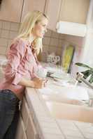 Woman At Kitchen Counter