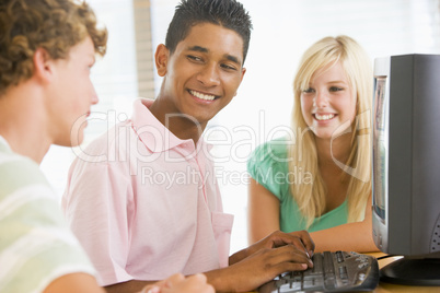 Teenagers Using Desktop Computer Together