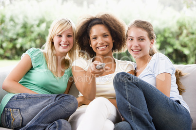 Teenage Girls Sitting On Couch