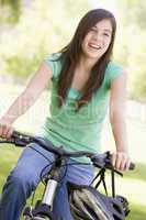 Teenage Girl On Bicycle