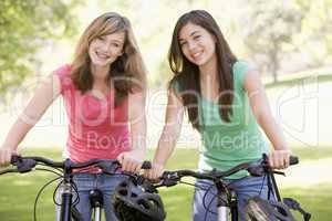 Teenage Girls On Bicycles