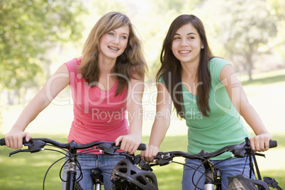 Teenage Girls On Bicycles
