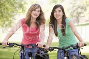 Teenage Girls On Bicycles