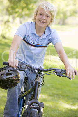 Teenage Boy On Bicycle