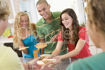 Teenagers Making Sandwiches