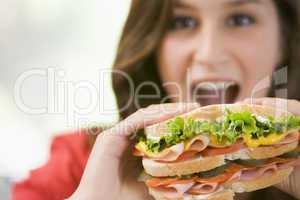 Teenage Girl Eating Sandwich