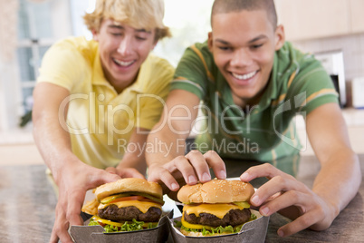 Teenage Boys Eating Burgers