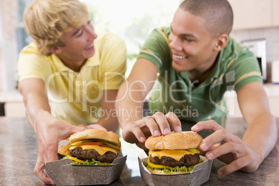 Teenage Boys Eating Burgers