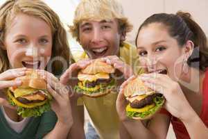 Teenagers Eating Burgers