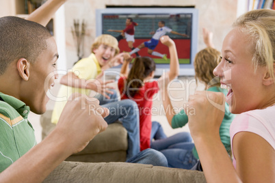 Teenagers Hanging Out In Front Of Television