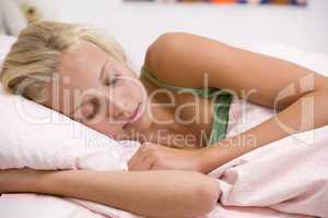 Teenage Girl Lying On Her Bed