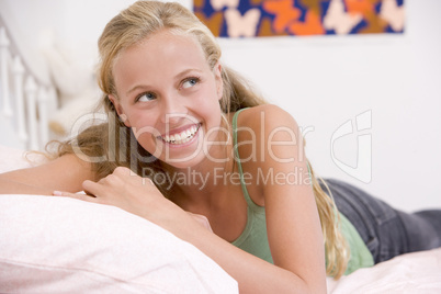 Teenage Girl Lying On Her Bed