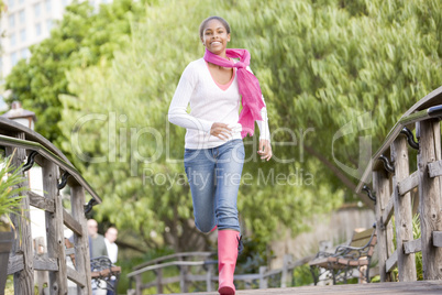 Teenage Girl Jogging In Park
