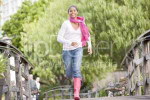 Teenage Girl Jogging In Park
