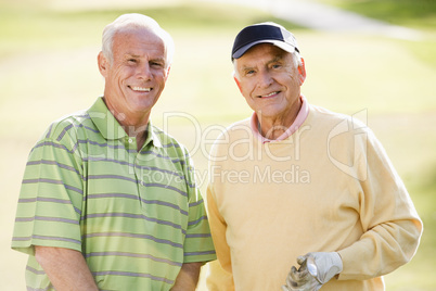 Portrait Of two Friends Enjoying A Game Golf