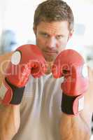 Man Boxing At Gym