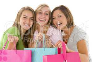 Portrait Of Teenage Girls Holding Shopping Bags