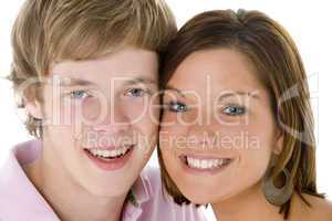 Close-Up Portrait Of Teenage Couple,