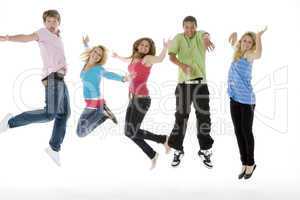 Teenagers Jumping In The Air