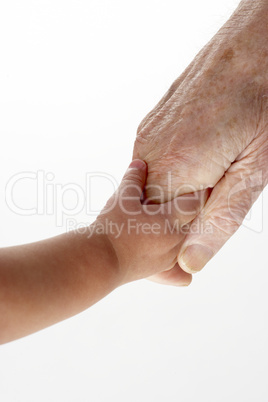 Eine junge Hand hält eine alte Hand
