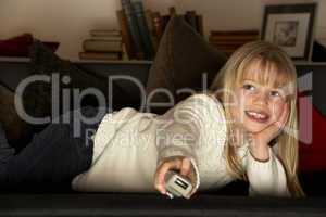 Young Girl Using Television Remote Control