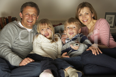 Family Watching Television Together