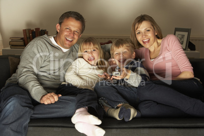 Family Watching Television Together