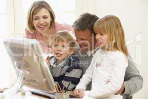 Family Group Using Computer