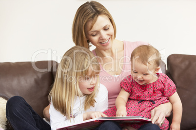 Mother And Daughters Reading Book