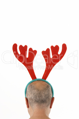 Man Wearing Reindeer Antlers