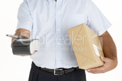 Courier Holding A Parcel And An Electronic Clipboard