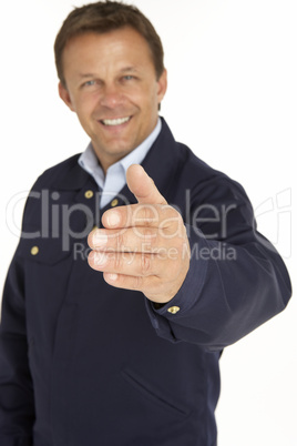 Courier Extending His Hand For A Handshake, Smiling At The Camer