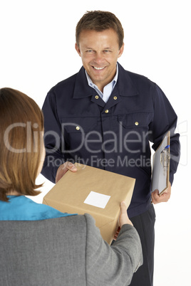 Courier Handing Over A Parcel To An Office Worker