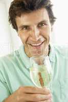 Man Drinking A Glass Of White Wine