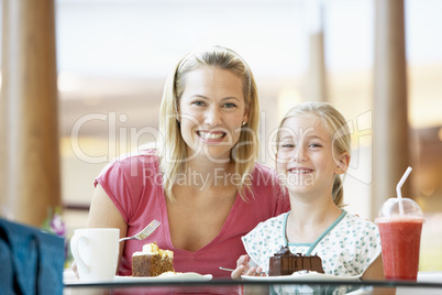 Mother And Daughter Having Lunch Together At The Mall