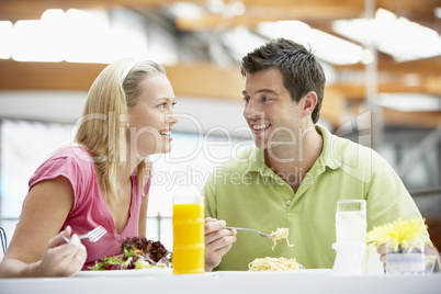 Couple Having Lunch At The Mall