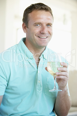 Man Enjoying A Glass Of White Wine Man Enjoying A Glass Of White Wine