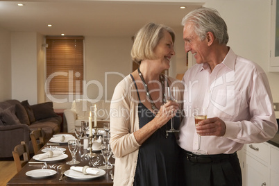 Couple Throwing A Dinner Party