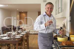 Man Preparing Food For A Dinner Party