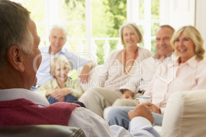 Friends Socializing At Home