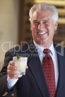 Man Having A Drink At A Bar