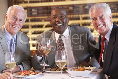 Friends Having Dinner Together At A Restaurant