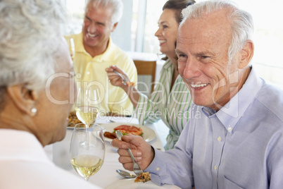 Friends Having Lunch Together At A Restaurant