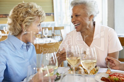 Friends Having Lunch Together At A Restaurant