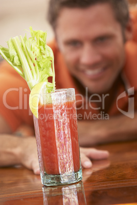 Man Reaching For A Bloody Mary