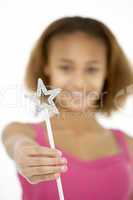 Young Girl Holding Fairy Wand