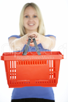 Woman Holding Shopping Basket