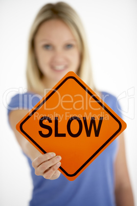 Woman Holding Road Traffic Sign