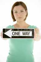 Woman Holding Road Traffic Sign