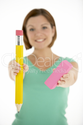 Woman Holding Big Pencil And Eraser